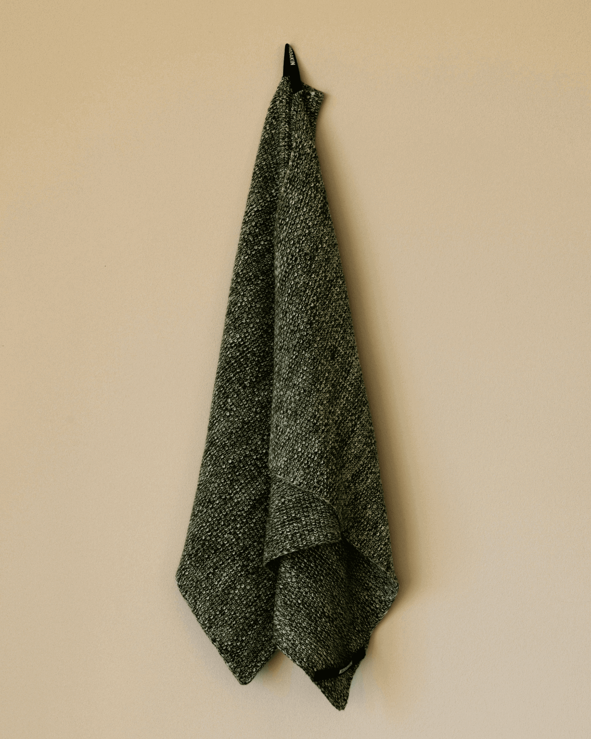 Køkkenhåndklæde i økologisk mørkegrøn melange bomuldsgarn, perfekt til den bevidste forbruger