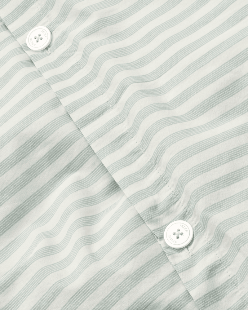 close up af knapper i sengesættet mint stripe fra Studio Feder